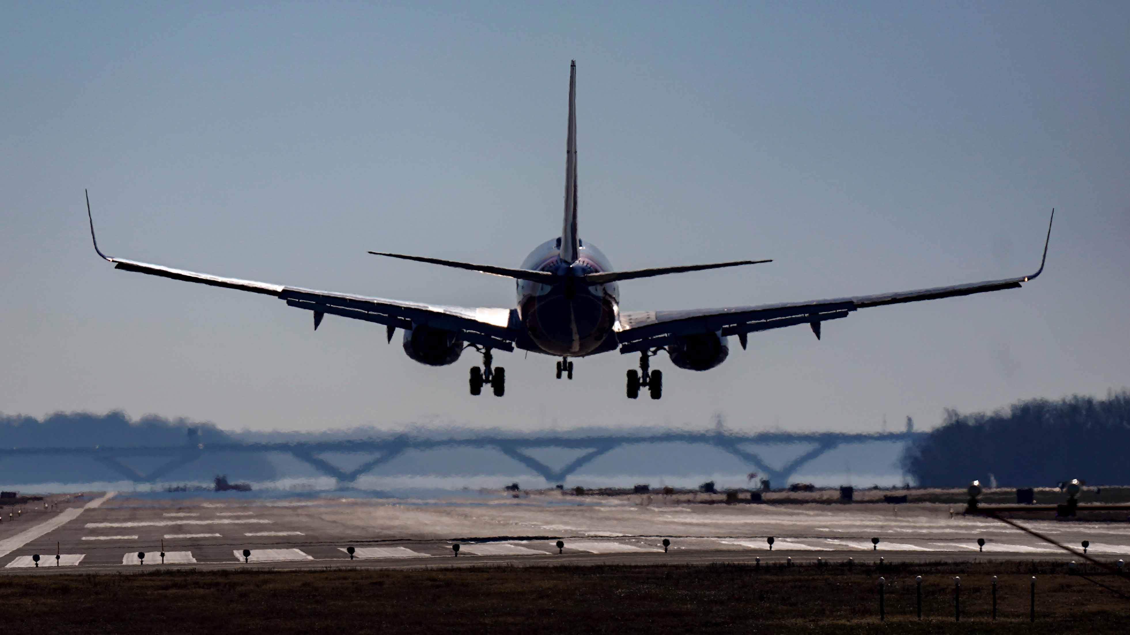 A Southwest plane lands at Ronald Reagan Washington National Airport in Arlington, Va., Friday, Dec. 30, 2022. A computer outage at the Federal Aviation Administration brought flights to a standstill across the U.S. on Wednesday, with hundreds of delays quickly cascading through the system at airports nationwide.