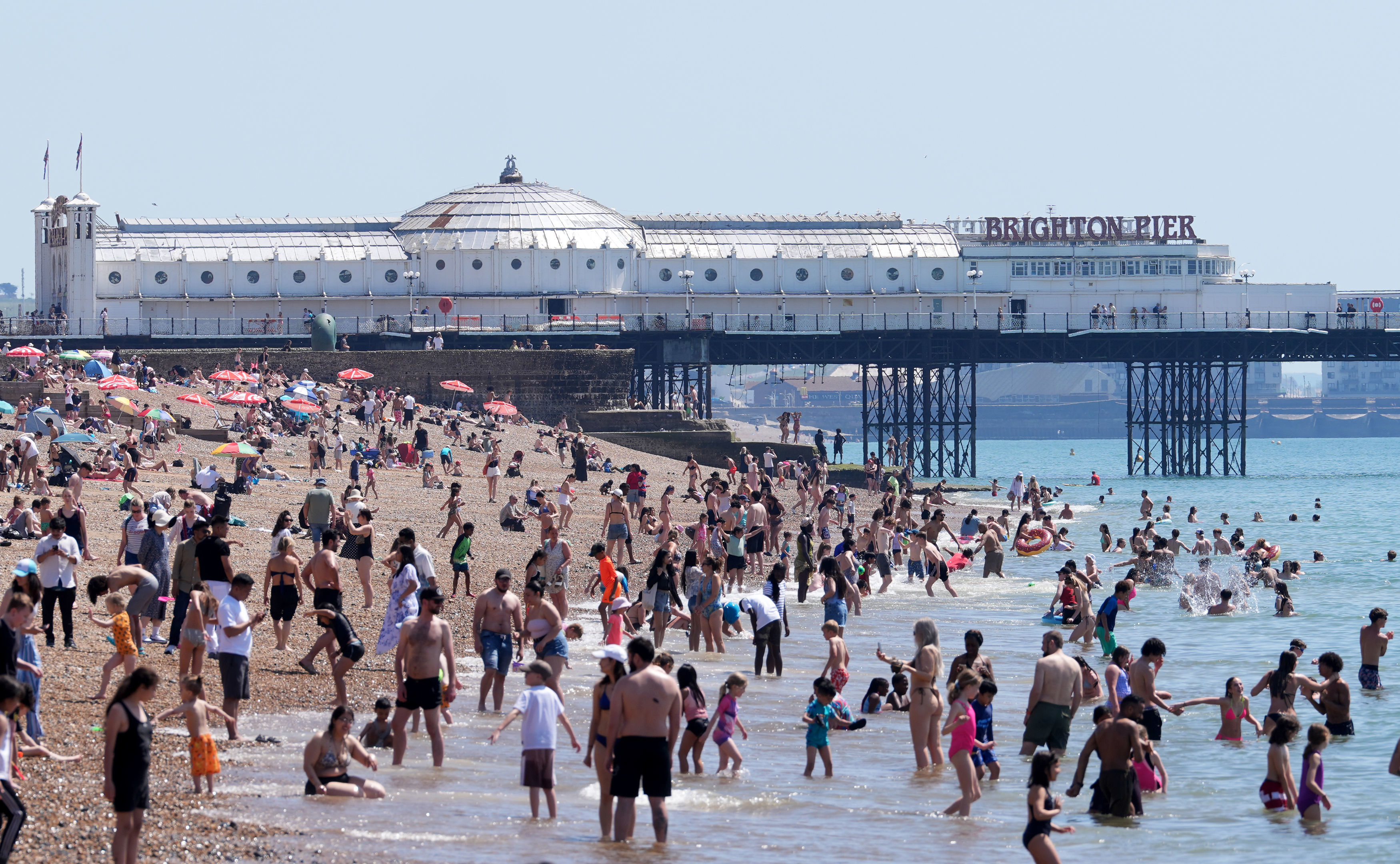 A view of the beach as people enjoy the hot weather in Brighton, East Sussex, England, Tuesday May 26, 2026. 