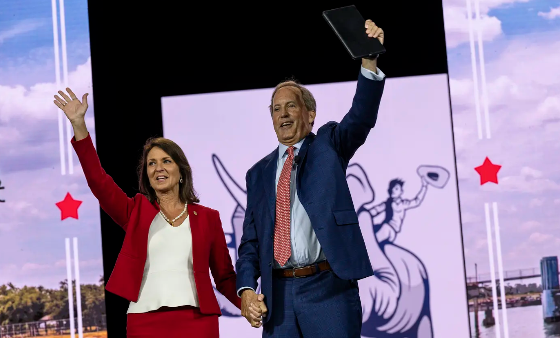 Texas Attorney General Ken Paxton and his wife Senator Angela Paxton wave to conventioneers during the Texas GOP Convention Thursday, May 23, 2024 in San Antonio.