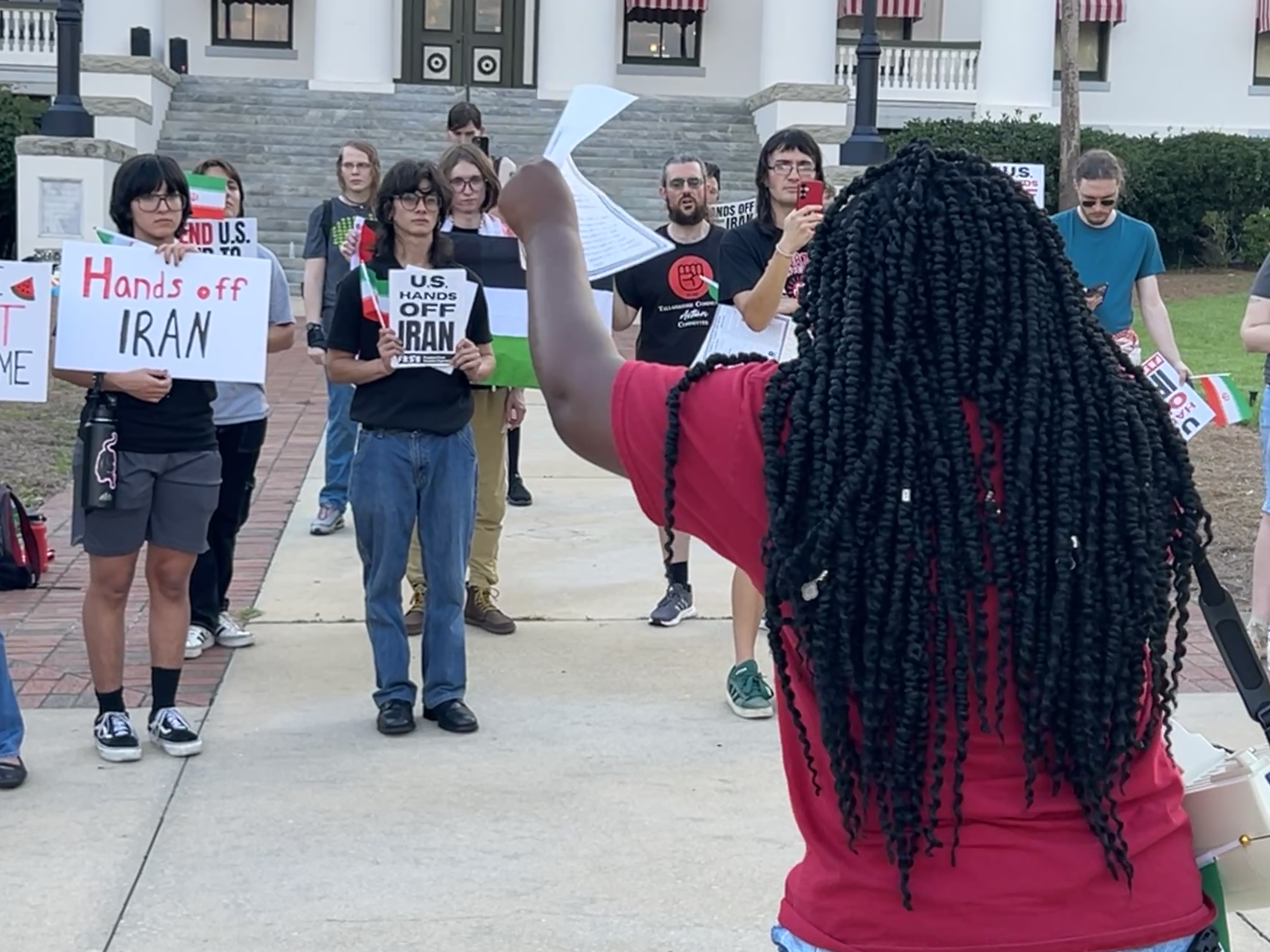 "NO WAR": Tallahassee neighbors protest American military involvement in the Middle East