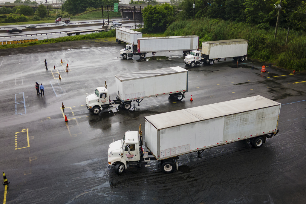 Trucking students practice reverse parking in training trucks at the Driving Academy on Thursday, Sept. 14, 2017 in Linden, N.J., where students prepare to obtain a Commercial Driver’s License (CDL) with multilingual instructors. 