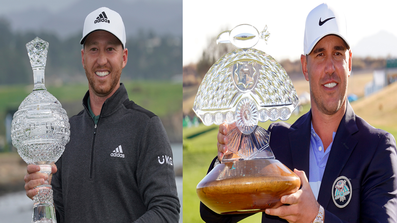 Daniel Berger and Brooks Koepka holding February 2021 PGA Tour trophies