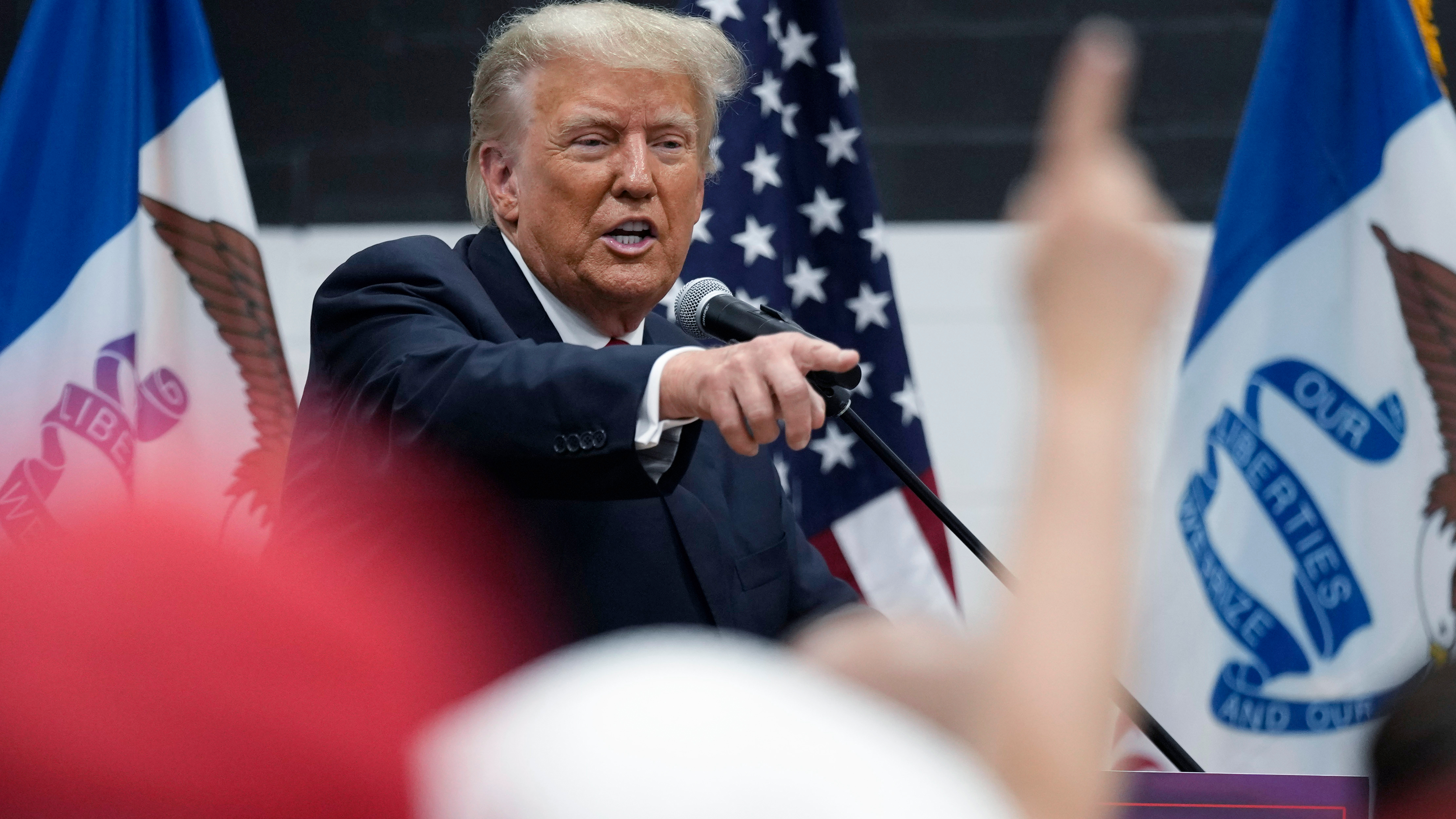 Former President Donald Trump visits with campaign volunteers at the Grimes Community Complex Park, Thursday, June 1, 2023, in Des Moines, Iowa. 