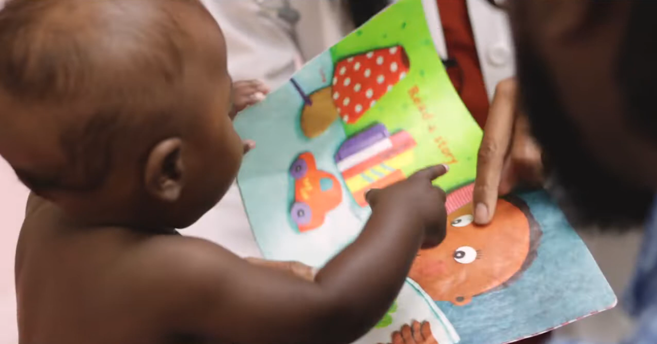 Reach Out and Read begins when children are six months old.