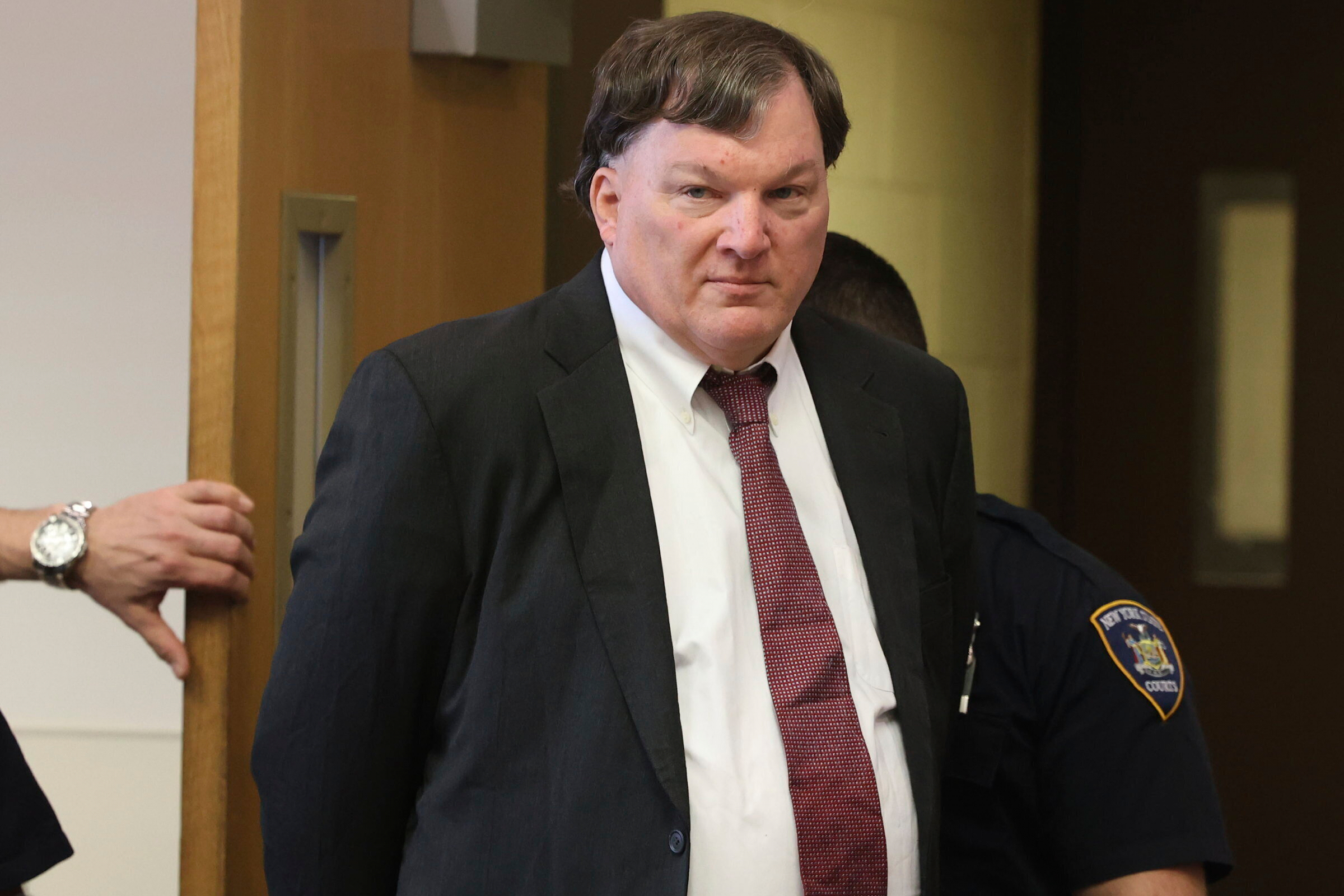 Rex Heuermann appears in Judge Timothy Mazzei's courtroom at Suffolk County Court in Riverhead, N.Y., for a status conference, Feb. 25, 2025.