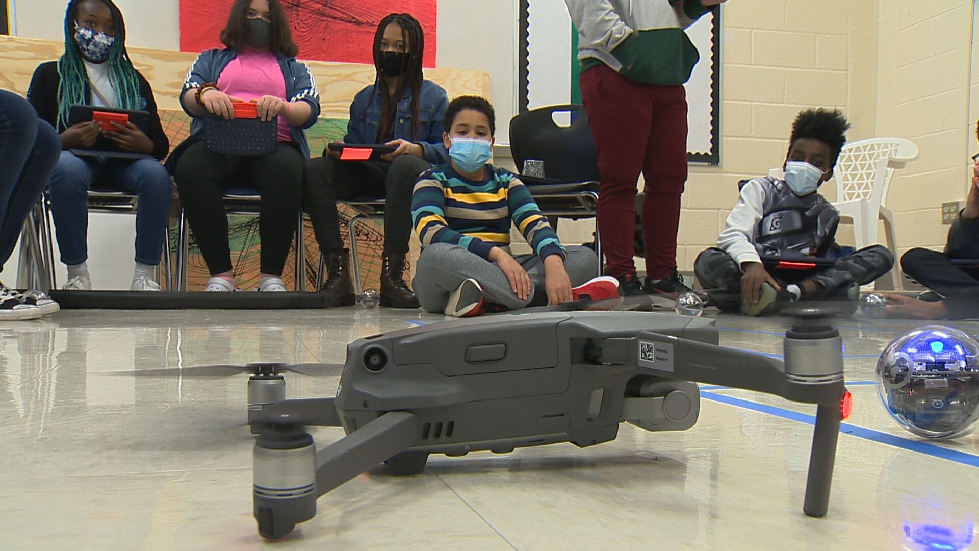 Antioch Middle School children play with drones for STEAM grant program