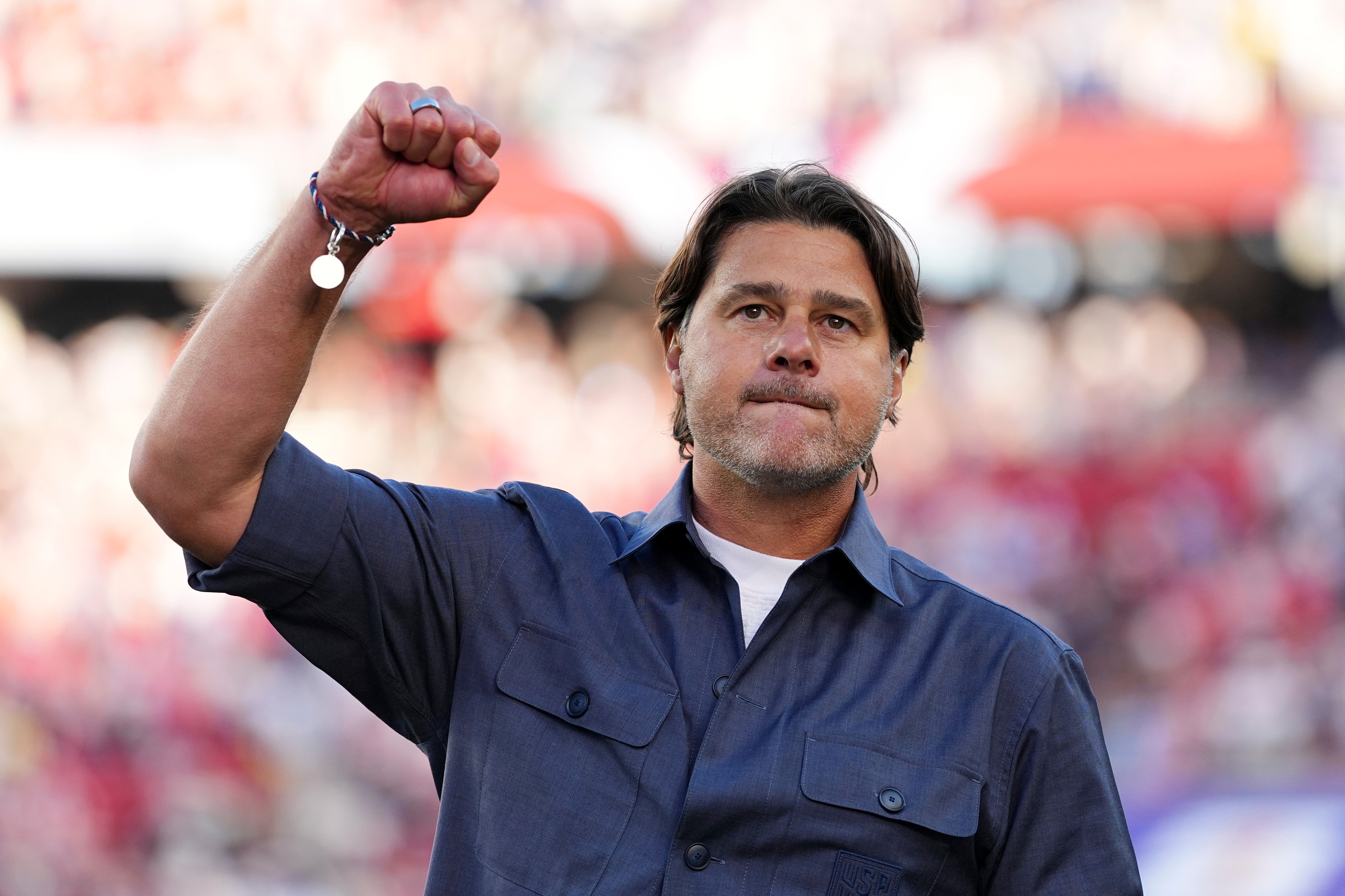 United States head coach Mauricio Pochettino gestures as he walks off the pitch after United States defeated Bosnia in the World Cup round of 32 soccer match between the United States and Bosnia in Santa Clara, Calif., near San Francisco, Wednesday, July 1, 2026. 