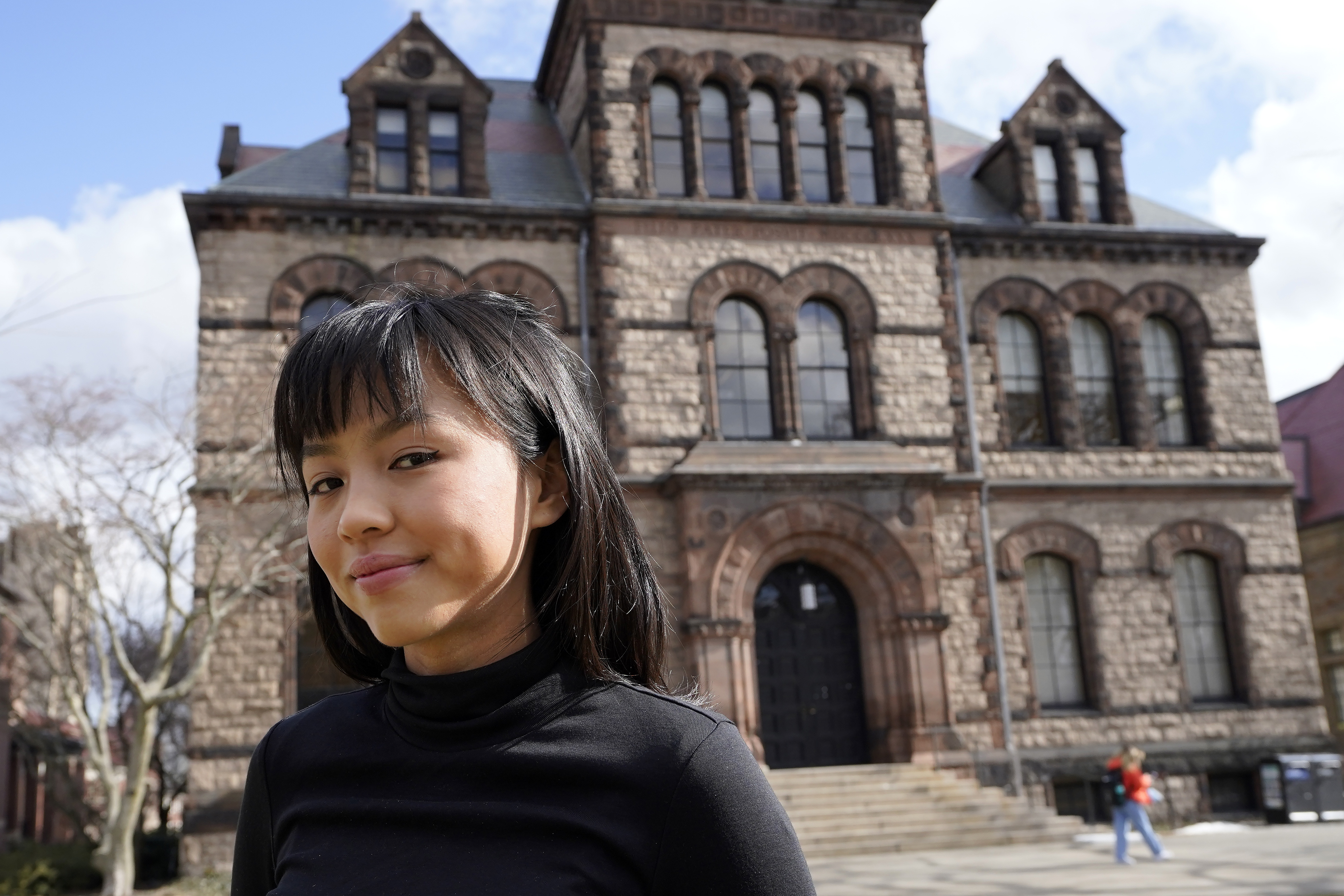 Brown University student Zoe Fuad, of Spring, Texas, stands for a photograph on the Brown campus, in Providence, R.I., Thursday, Feb. 10, 2022.