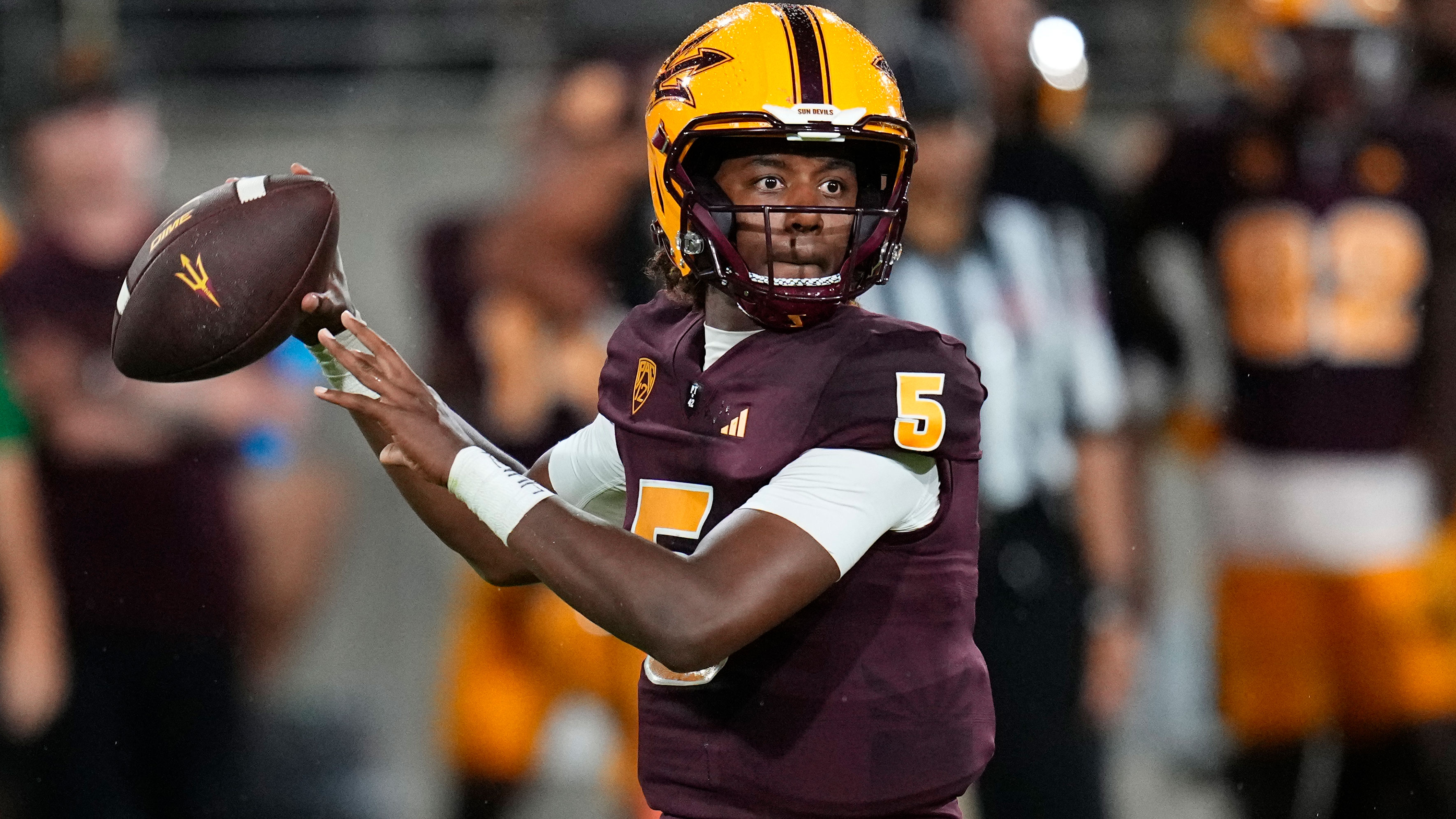Arizona State quarterback Jaden Rashada looks for a receiver during the team's NCAA college football game against Southern Utah on Sept. 1, 2023, in Tempe, Ariz. Florida is under NCAA investigation a year after a failed name, image and likeness deal worth more than $13 million with former signee Rashada. Rashada signed with Florida last December only to be granted his release a month later after his NIL deal fell through. He later signed with Arizona State. 