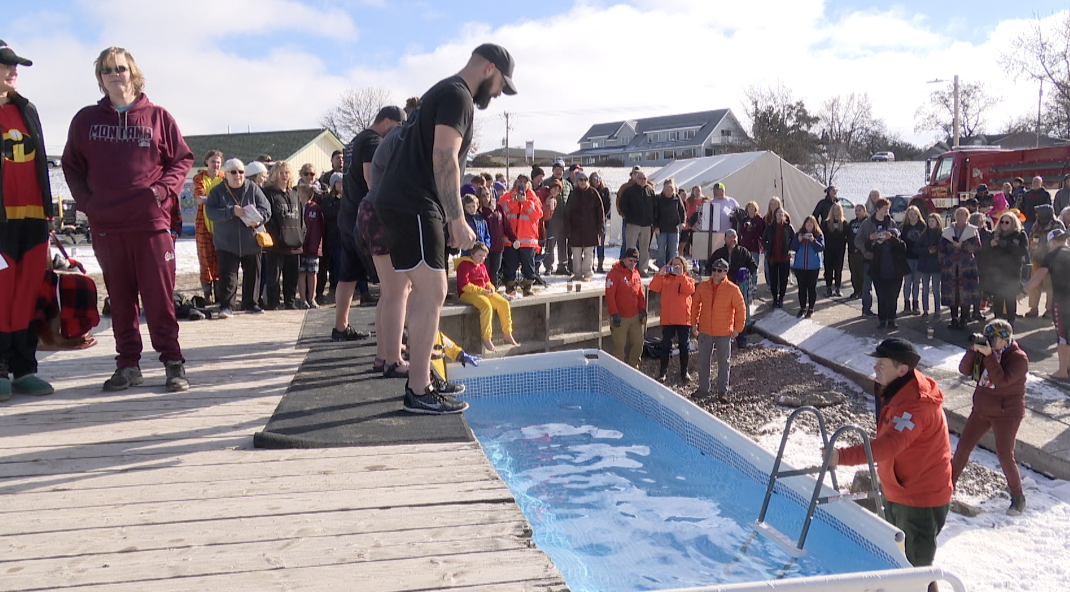 Polar plunge team waits to jump in pool, Polson