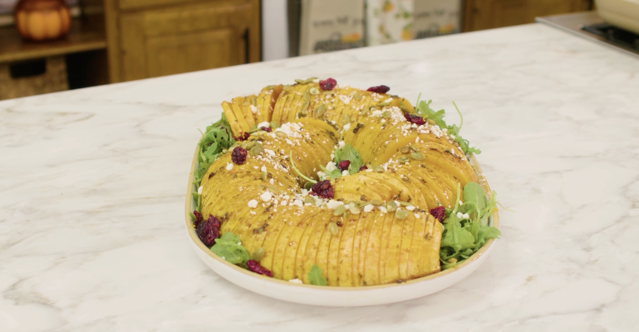Hasselback Butternut Squash Topped with Goat Cheese, Pumpkin Seeds, & Craisins