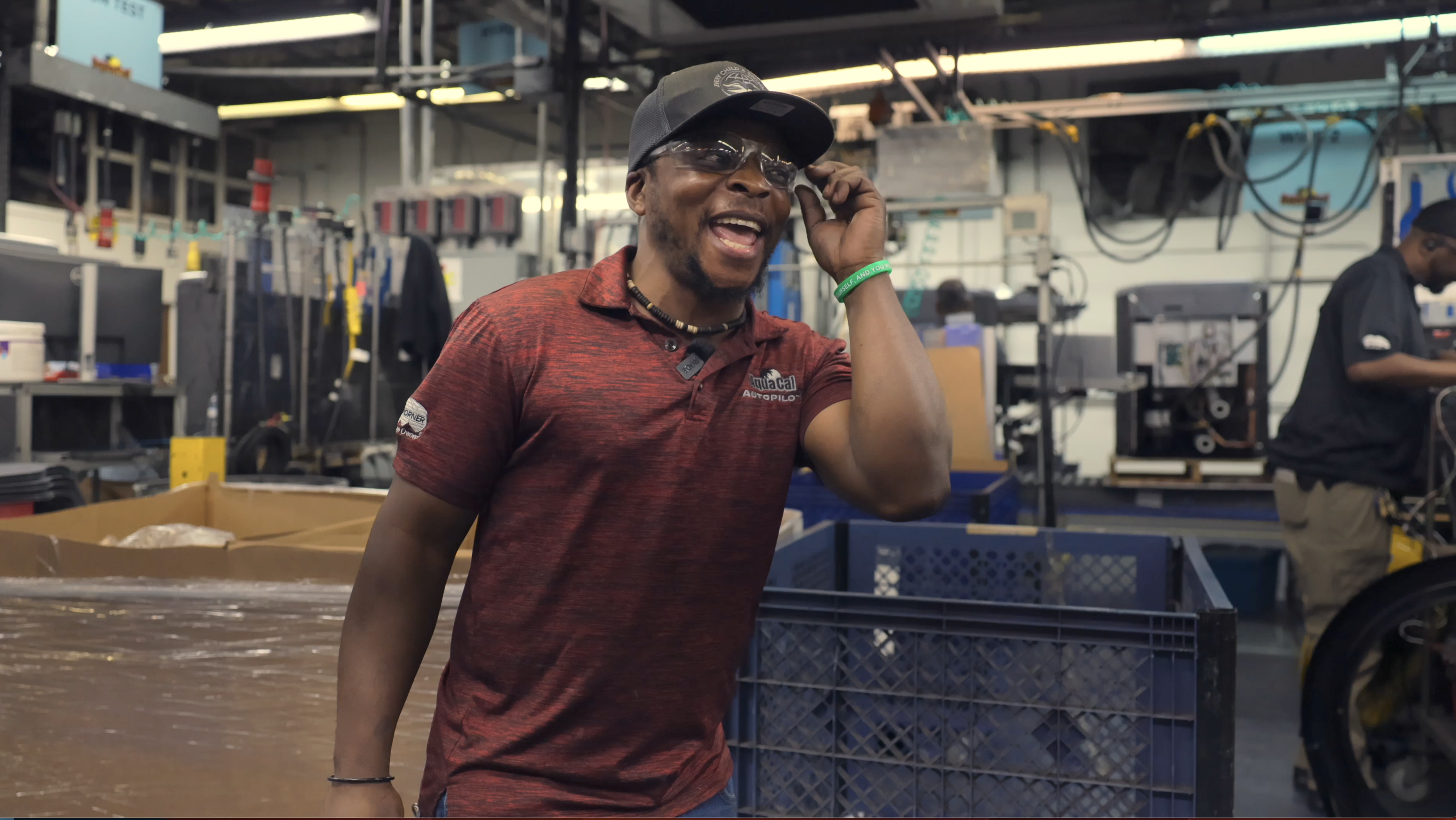 Agano Mumbere at his job in Pinellas County.