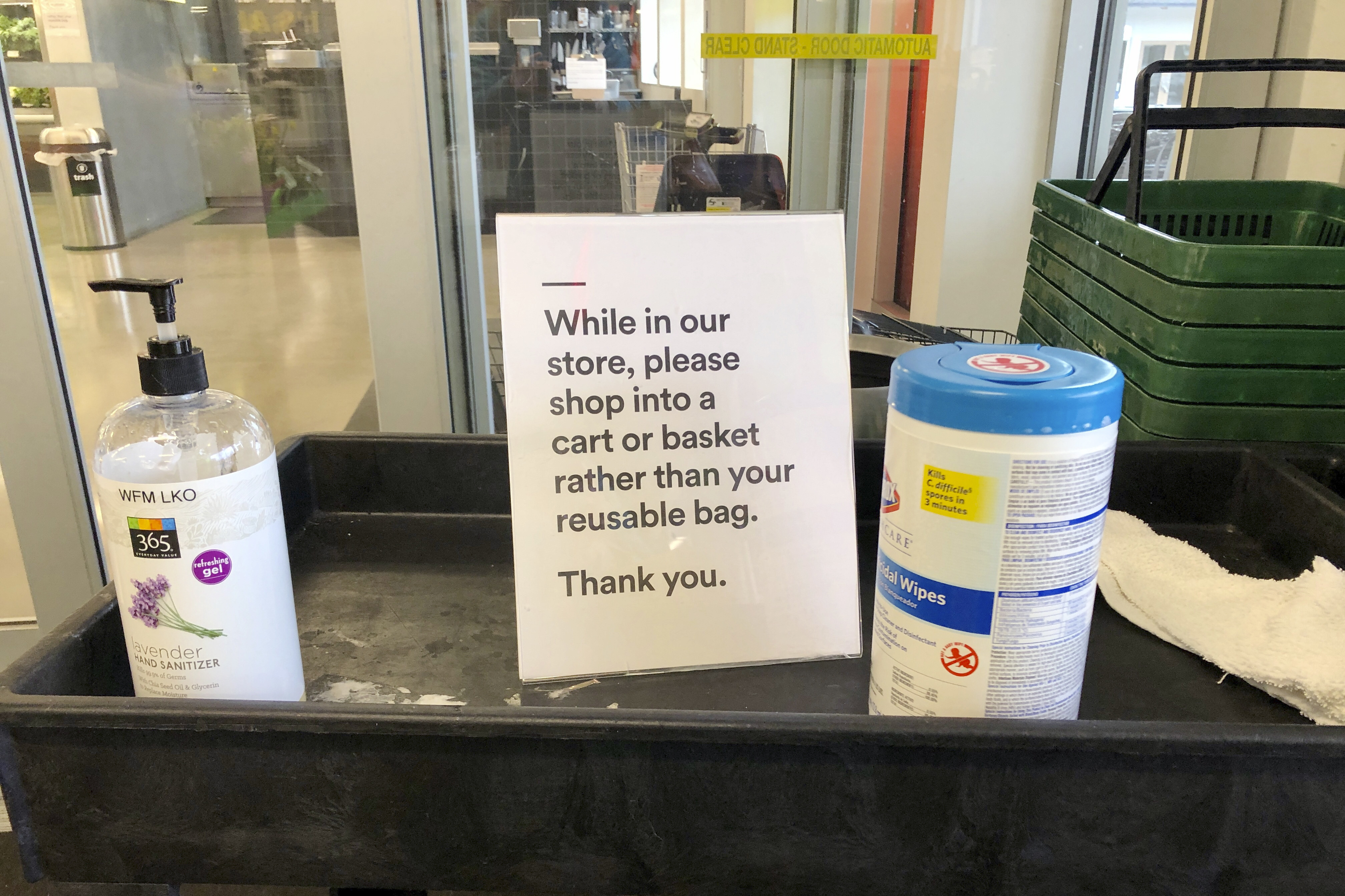 Plastic bag bans reversed as shoppers asked not to use reusable bags during crisis