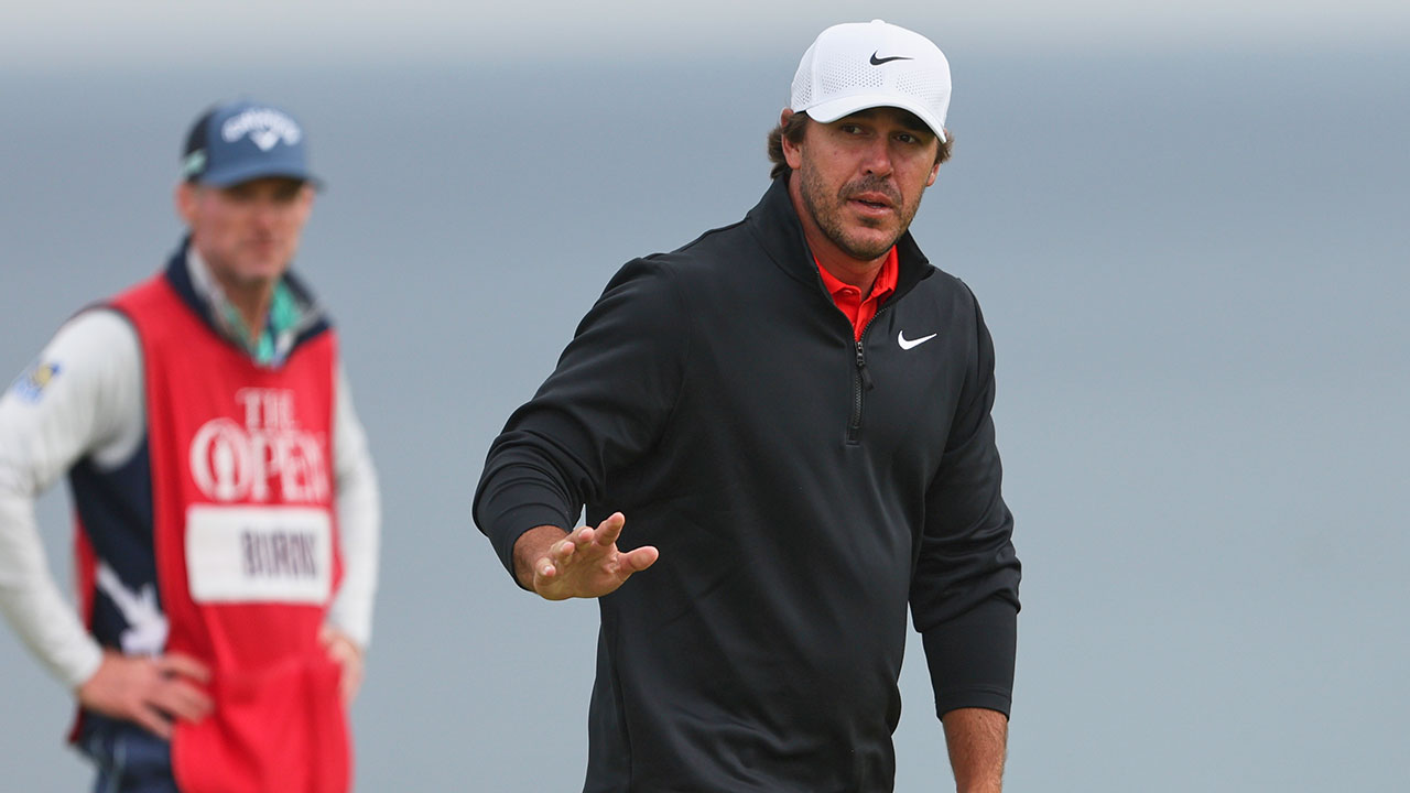 FILE - Brooks Koepka, of the United States, acknowledges the crowd on the 5th green during the first round of the British Open golf championship at the Royal Portrush Golf Club in Northern Ireland, July 17, 2025. 