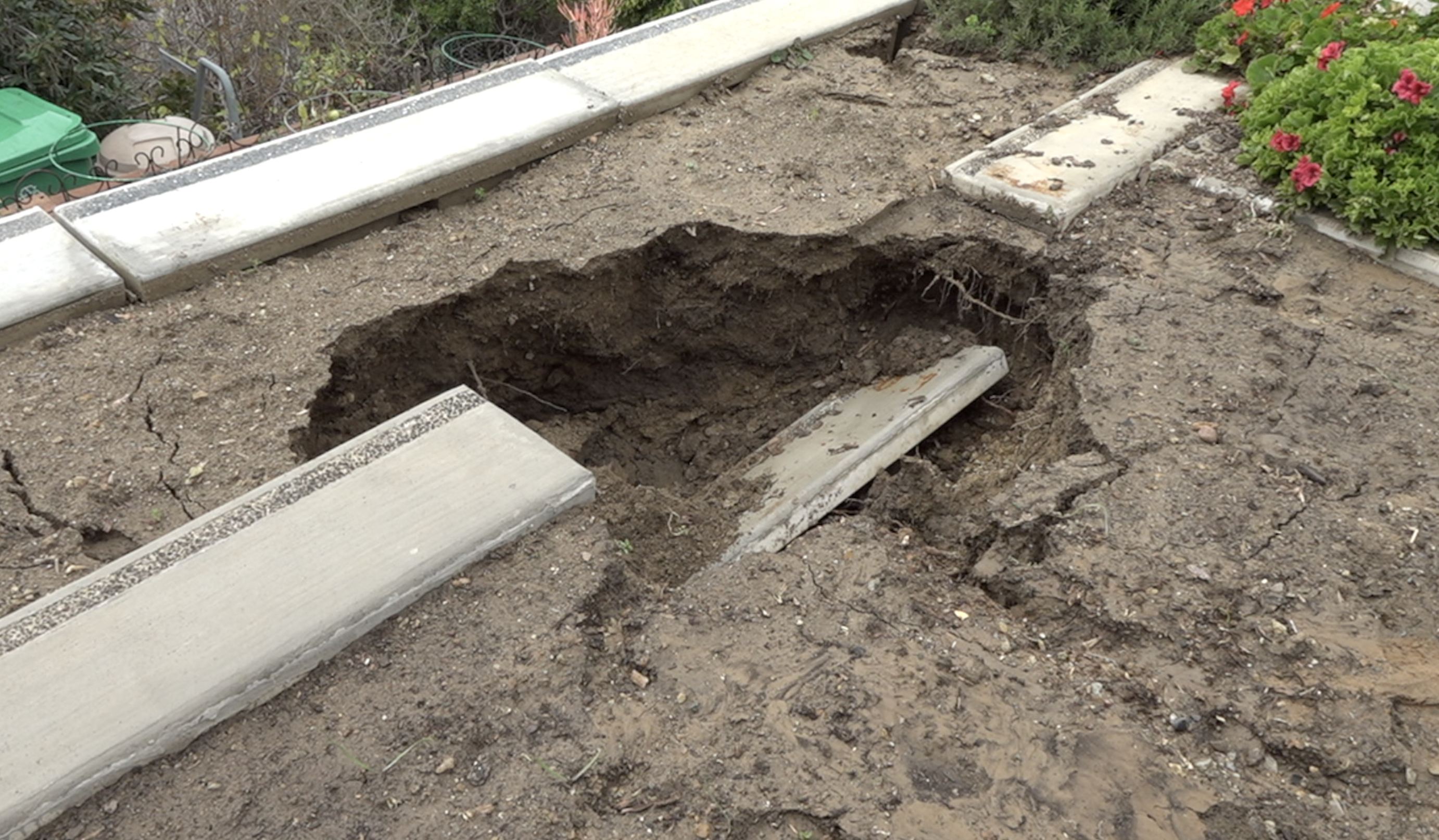 Broken water pipe in La Jolla causes sinkhole, mudslide, and flooding
