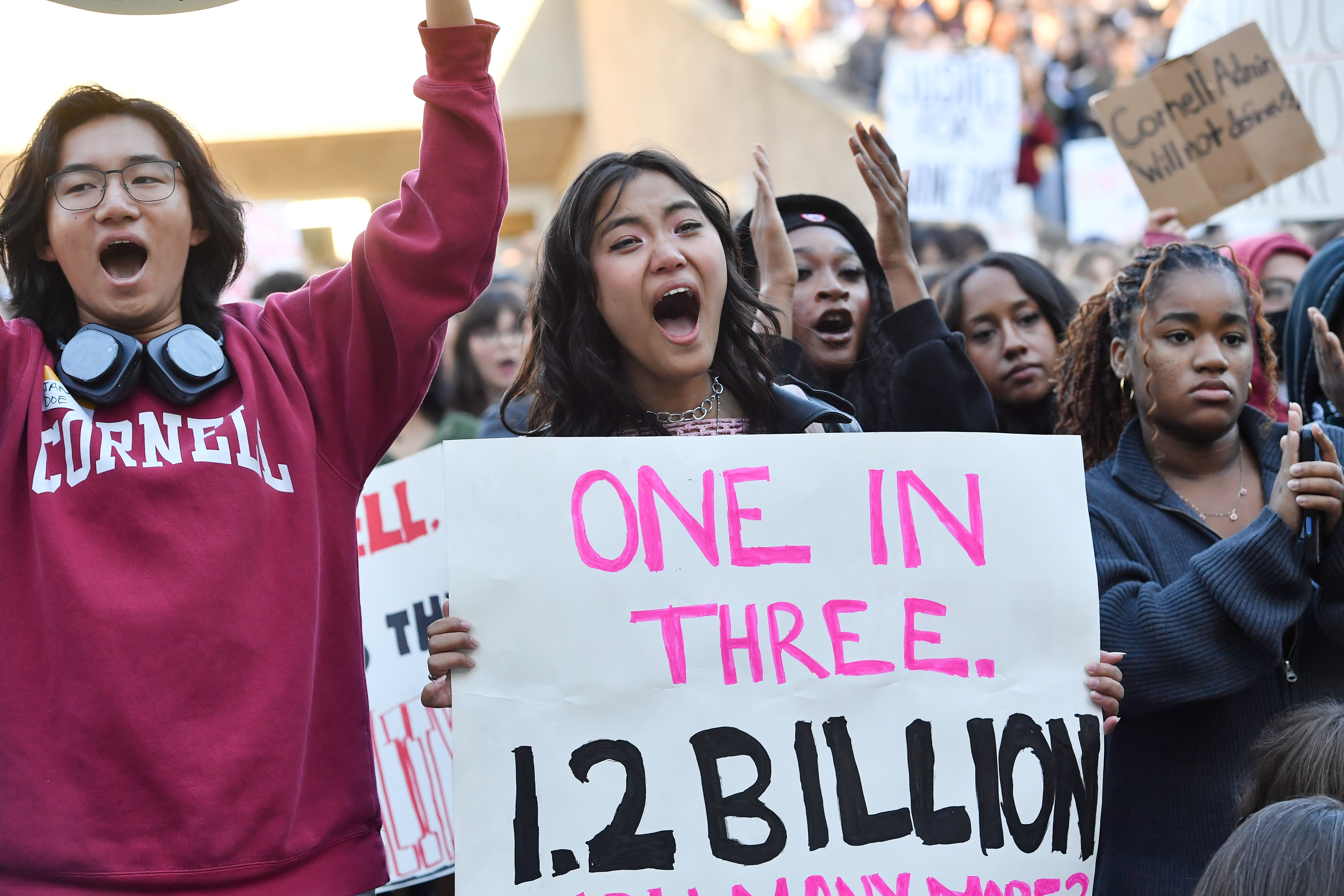 Demonstrators attend a protest against Cornell University's handling of the 2024 fraternity-house gang rape allegations at the campus, Monday, Oct. 5, 2026, in Ithaca, N.Y.