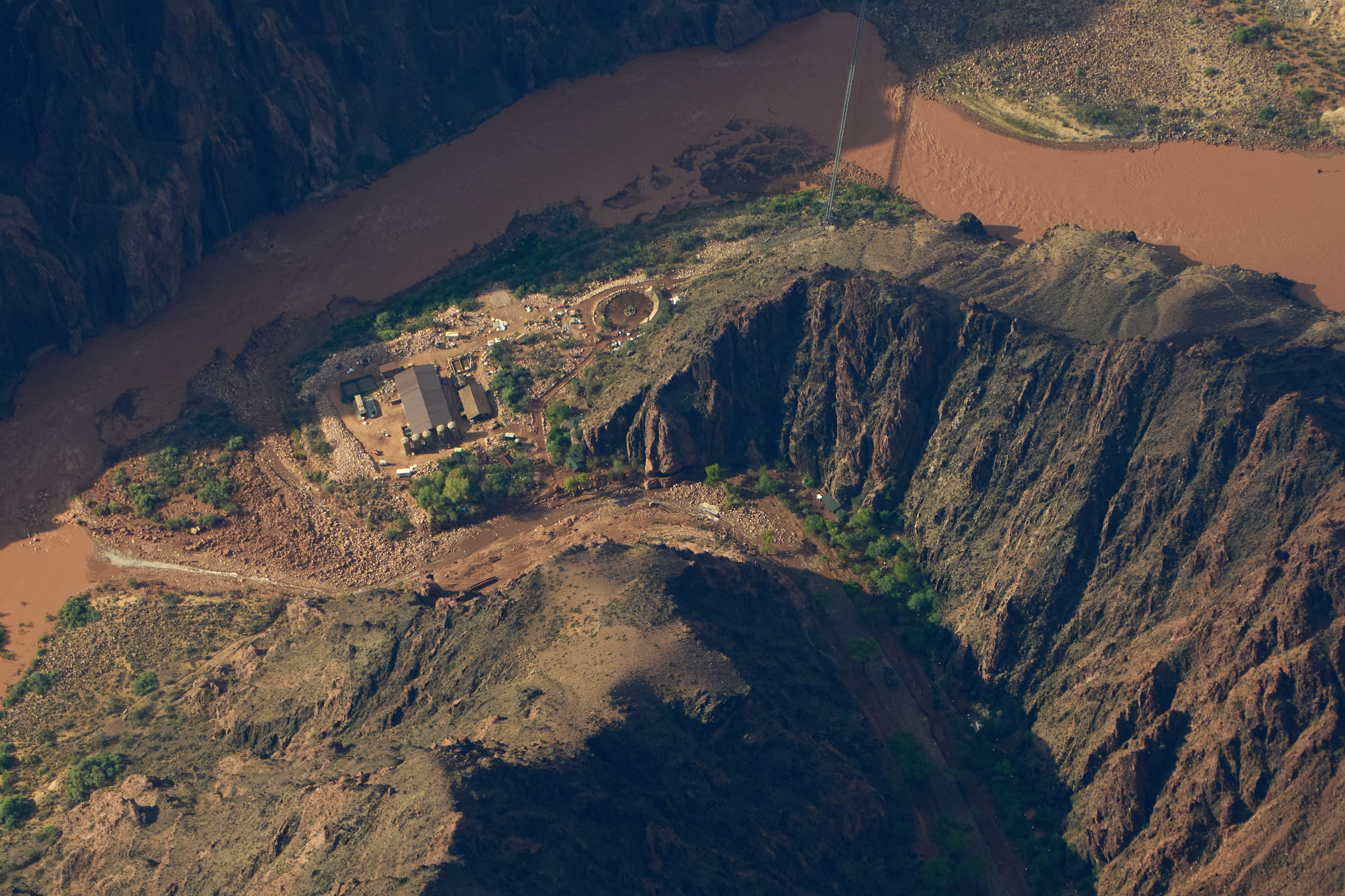 Flood debris lines Bright Angel Canyon near where it meets the Colorado River in the Grand Canyon, Monday, Aug. 31, 2026, at Grand Canyon National Park, Ariz.