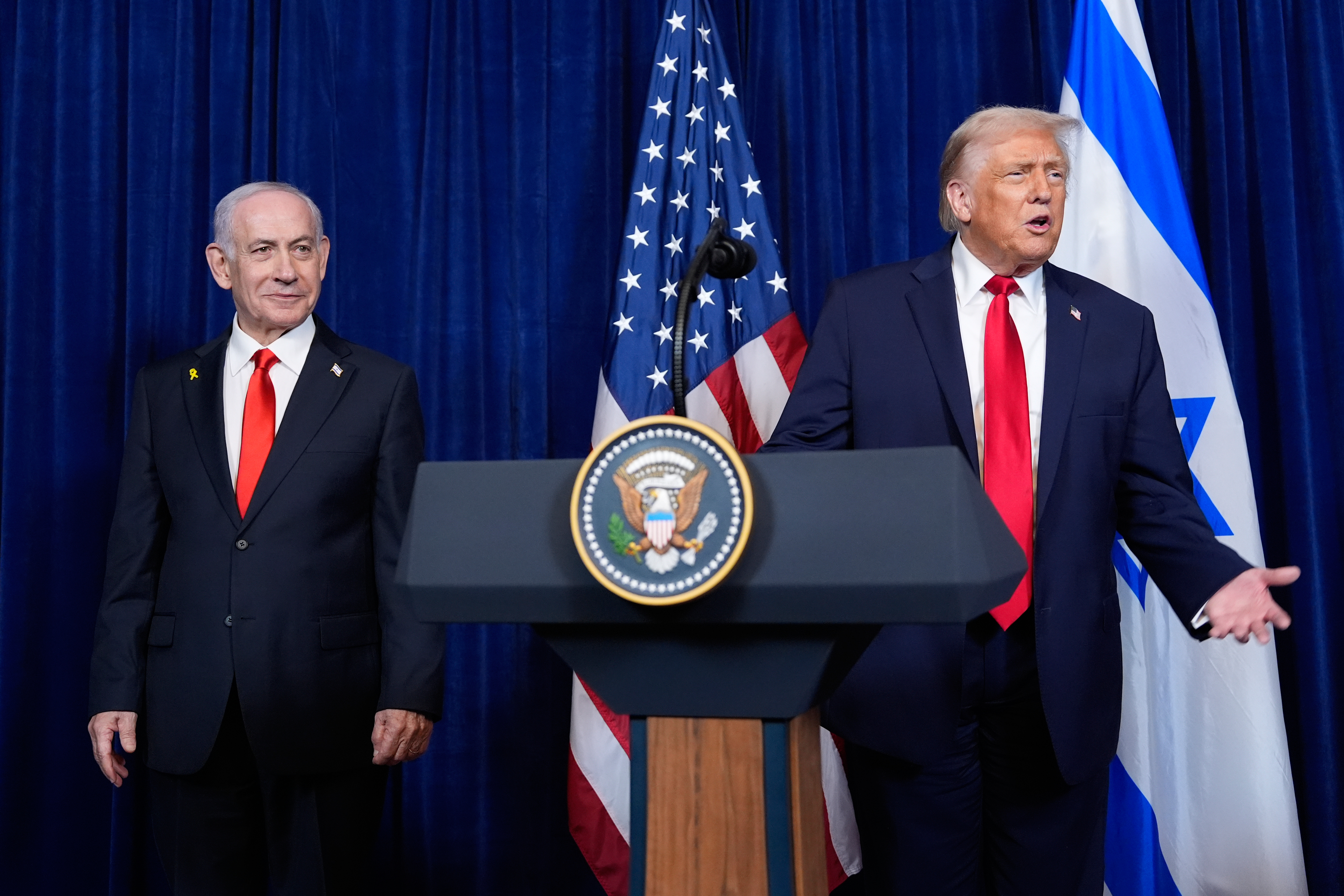 President Donald Trump answers a question from a reporter at the end of a news conference with Israel's Prime Minister Benjamin Netanyahu at Mar-a-Lago, Monday, Dec. 29, 2025, in Palm Beach, Fla. 