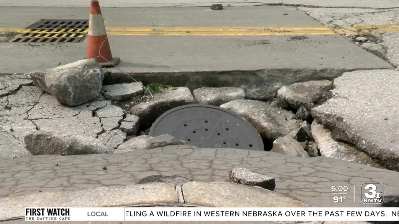 Old Market storm damage flooding manhole sinkhole