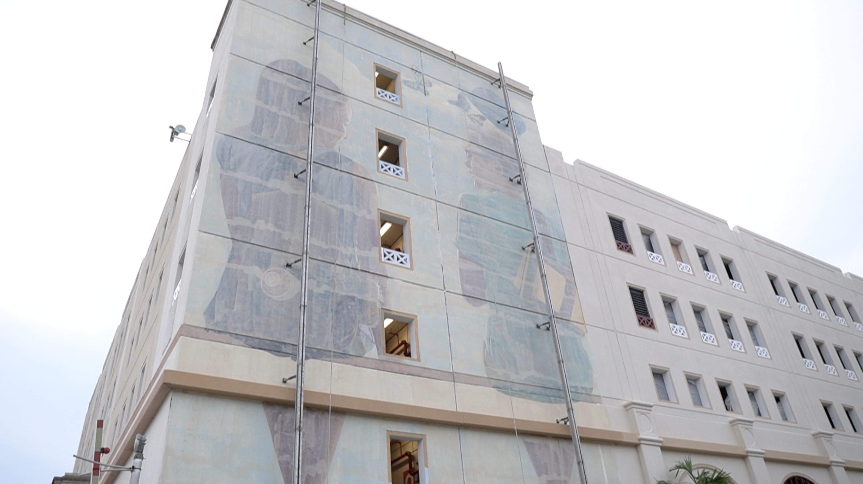 Parking garage mural painted over