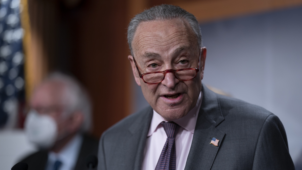 Senate Majority Leader Chuck Schumer, D-N.Y., meets with reporters during a news conference at the Capitol in Washington.