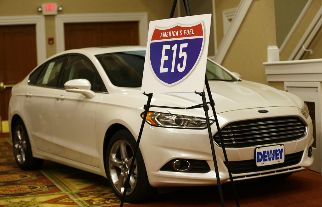 An E15 fuel sign sits on display in front of a car during the Iowa Renewable Fuels Association meeting, Tuesday, Jan. 28, 2014, in Altoona, Iowa. 