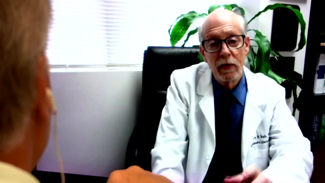 South Florida infectious disease specialist Dr. Larry Bush speaks to WPTV on July 29, 2022.jpg