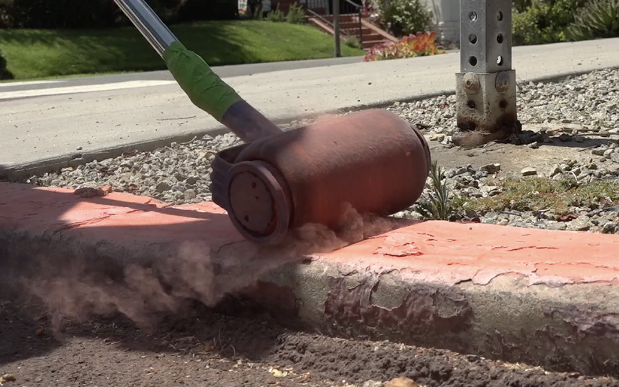Volunteers put red chalk on curbs to warn drivers about new law