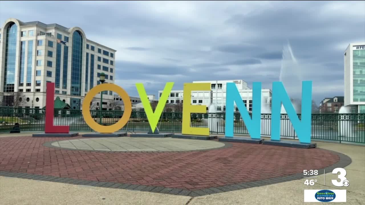 Walk around the fountain between rain showers at the Fountain Plaza in Newport News