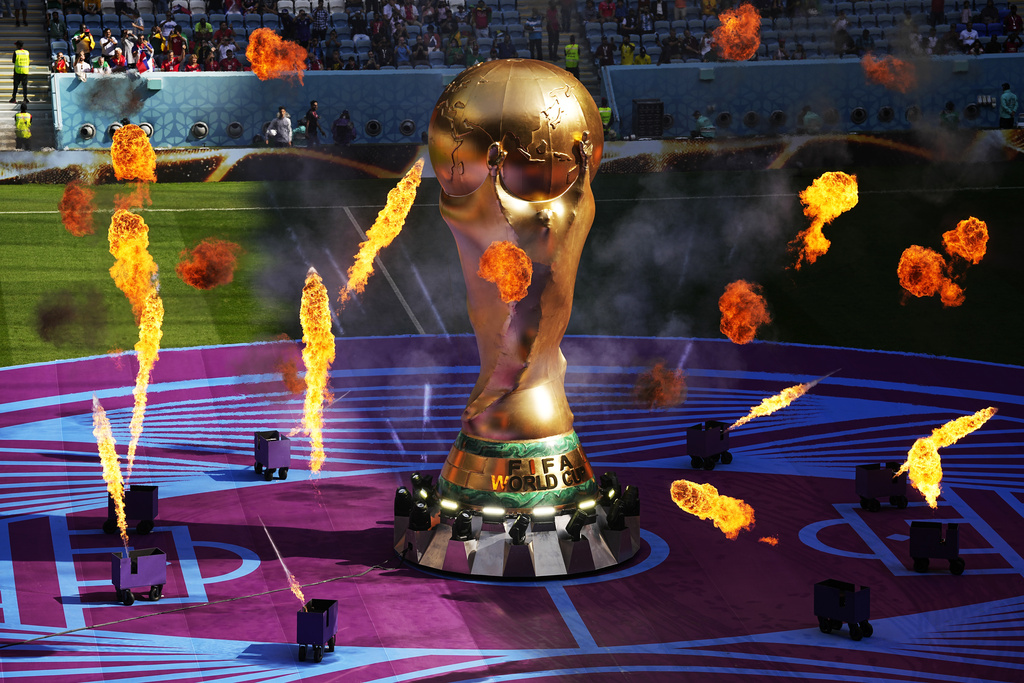 FILE - A giant copy of the trophy is displayed prior to the World Cup group G soccer match between Cameroon and Serbia, at the Al Janoub Stadium in Al Wakrah, Qatar, Nov. 28, 2022. 