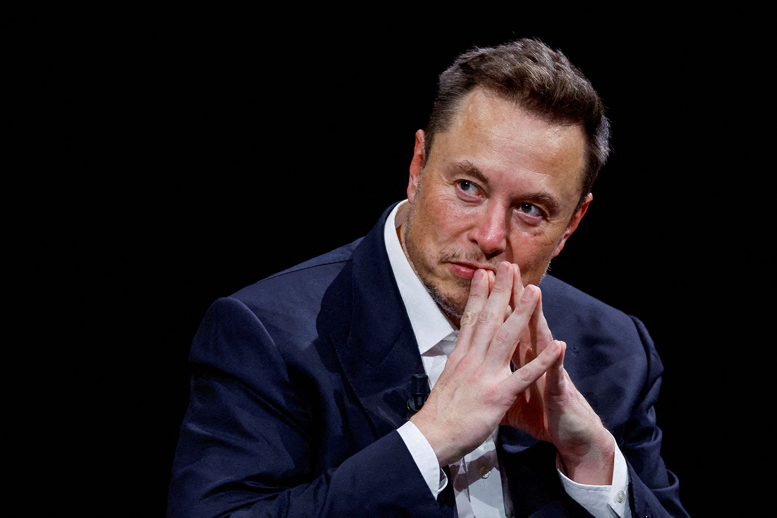 SpaceX CEO Elon Musk, pictured at a conference in Paris in June 2023, was sued by former employees who allege they were fired after raising concerns about a hostile work environment.