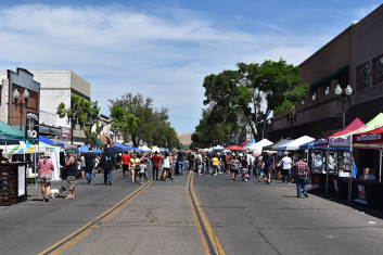 Vendor booths line both sides of Downtown Main St. in Porterville for the 21st Annual Iris Festival