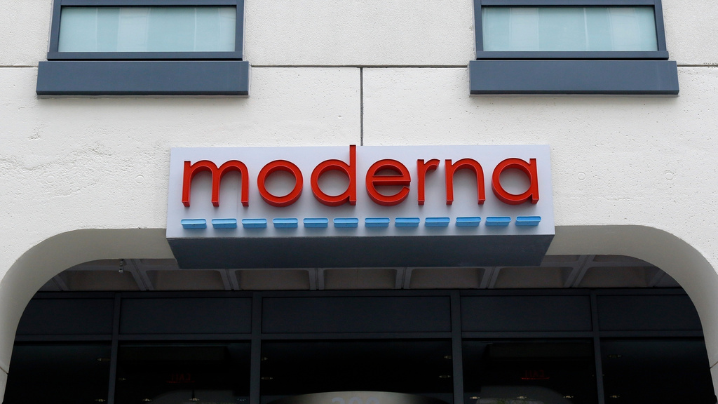 FILE - A sign marks an entrance to a Moderna building in Cambridge, Mass., May 18, 2020. 