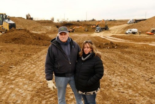 mark and julie nygren on their land.jpg