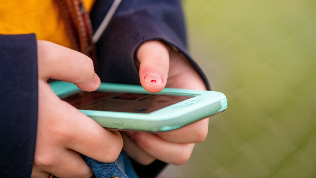 A person on their cellphone.