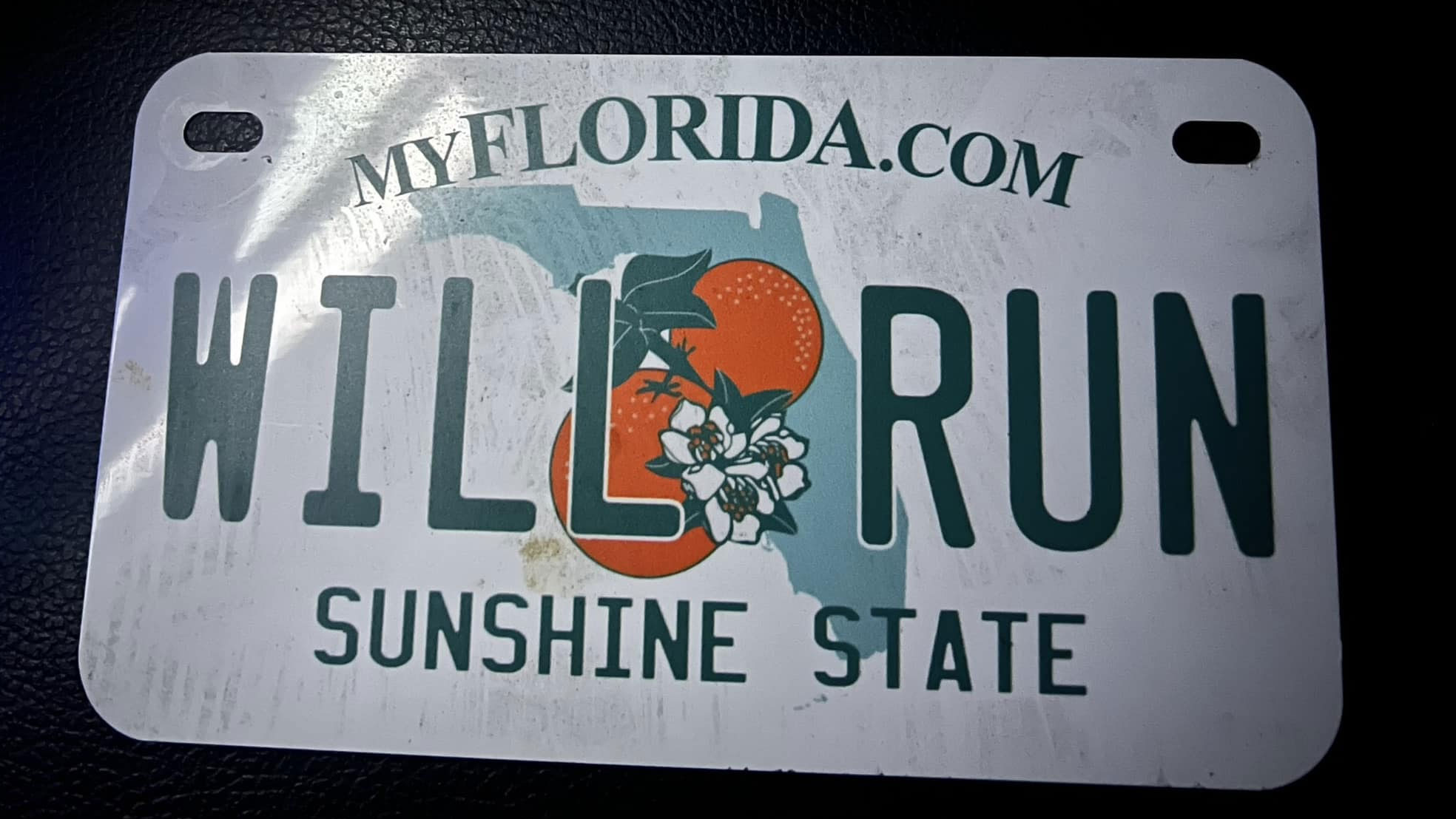 A Florida motorcyclist was arrested March 12, 2024, after fleeing multiple law enforcement agencies with an invalid 'Will Run' license plate.