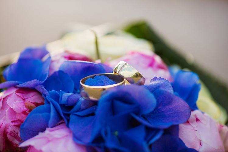 Wedding rings and bouquet
