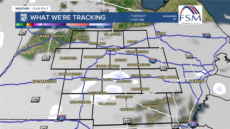 Light snow showers exist as a secondary cold front advances through our neighborhoods Tuesday