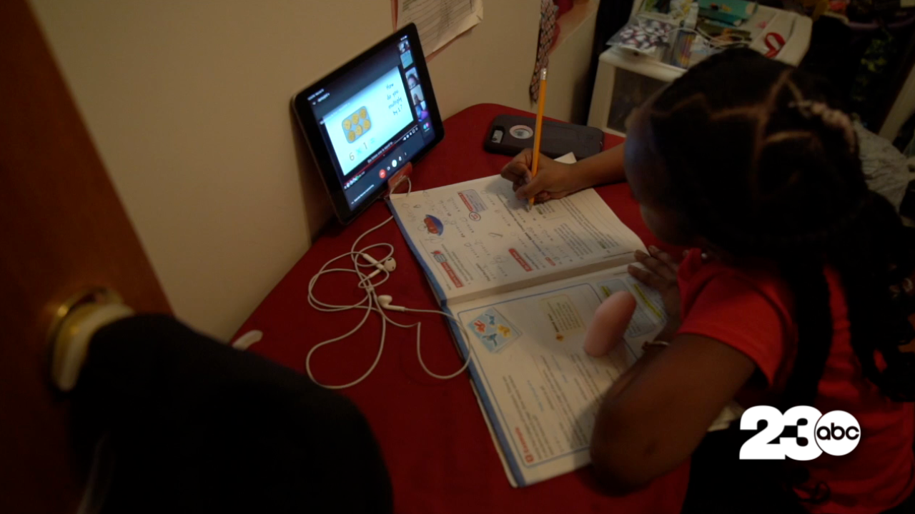 Student Works on Homework (FILE)