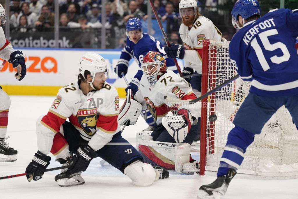Toronto Maple Leafs center Alexander Kerfoot tries to score as Florida Panthers goaltender Sergei Bobrovsky and Panthers defenseman Brandon Montour defend in second period of Game 2 of NHL playoff series, May 4, 2023