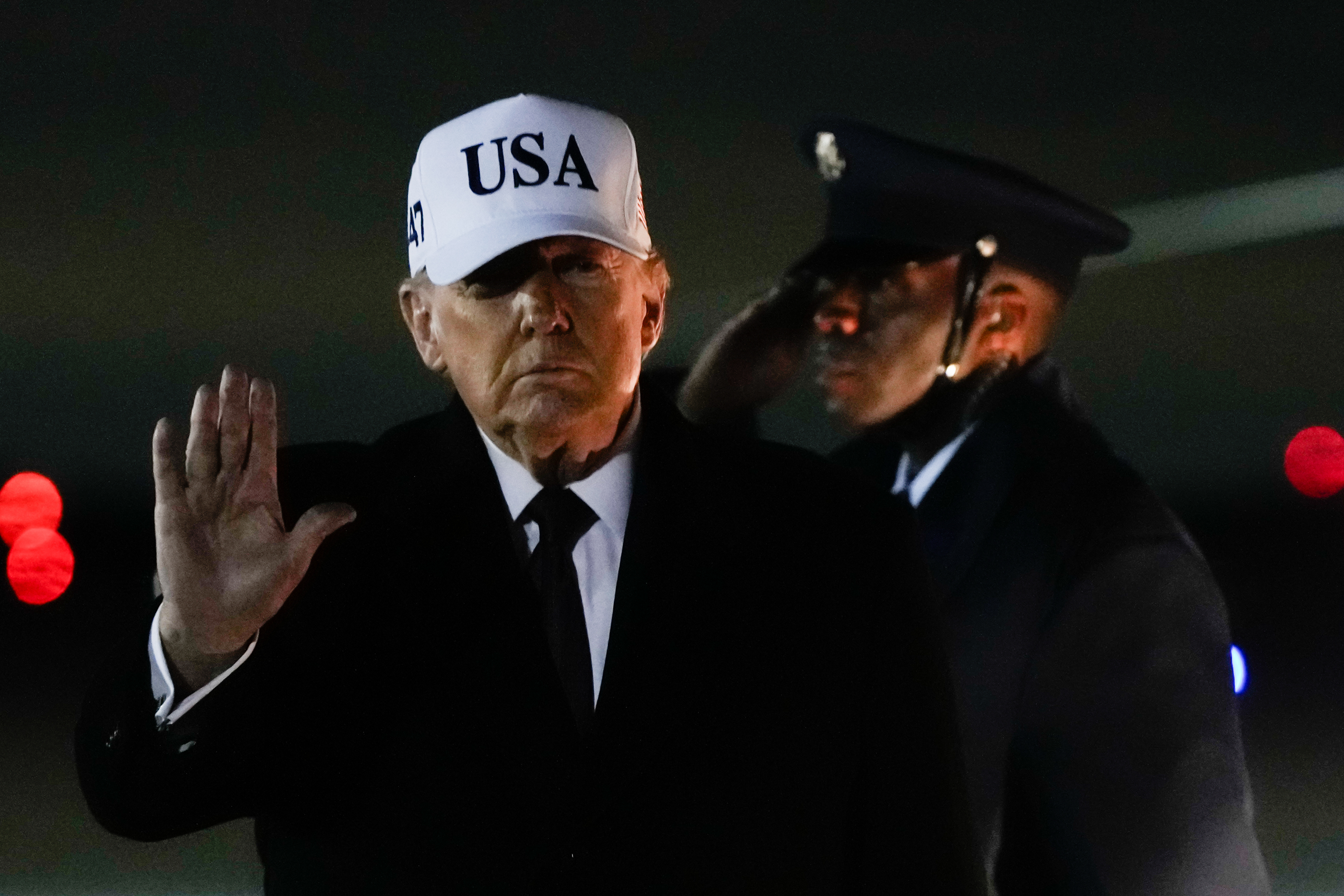 President Donald Trump waves after arriving on Air Force One from Florida, Jan. 11, 2026, at Joint Base Andrews, Md.