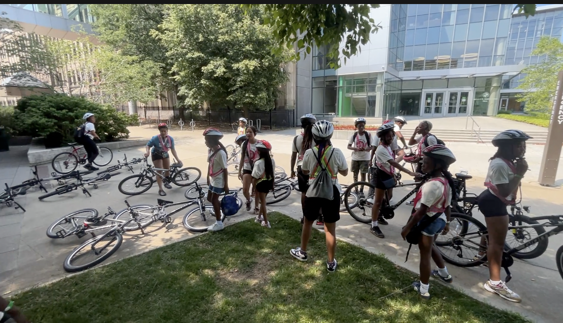 Youth peddling around Cleveland as part of Gear Up for STEM bike camp