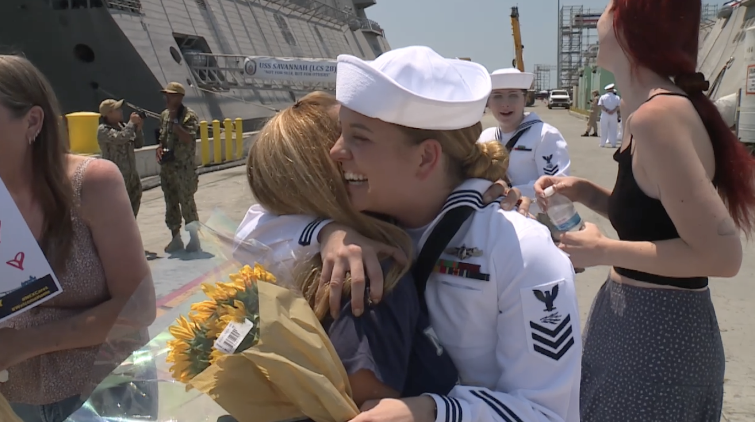 Sailors stationed at the U.S.S. Savannah reuniting with loved ones. 