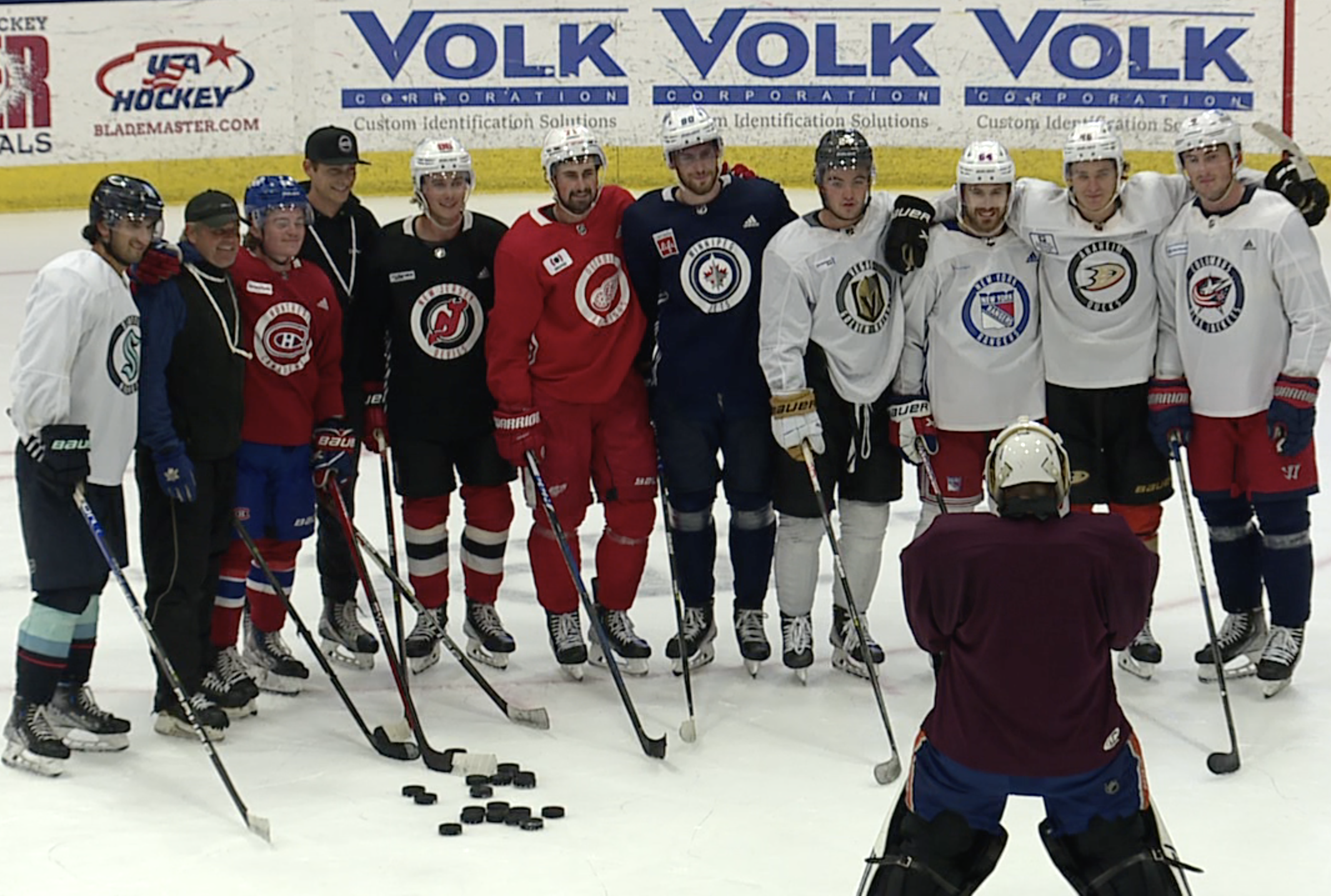 Dylan Larkin, Zach Werenski, Jack and Quinn Hughes, Matty Beniers, Cole Caufield, Trevor Zegras, and a group of players with Michigan roots