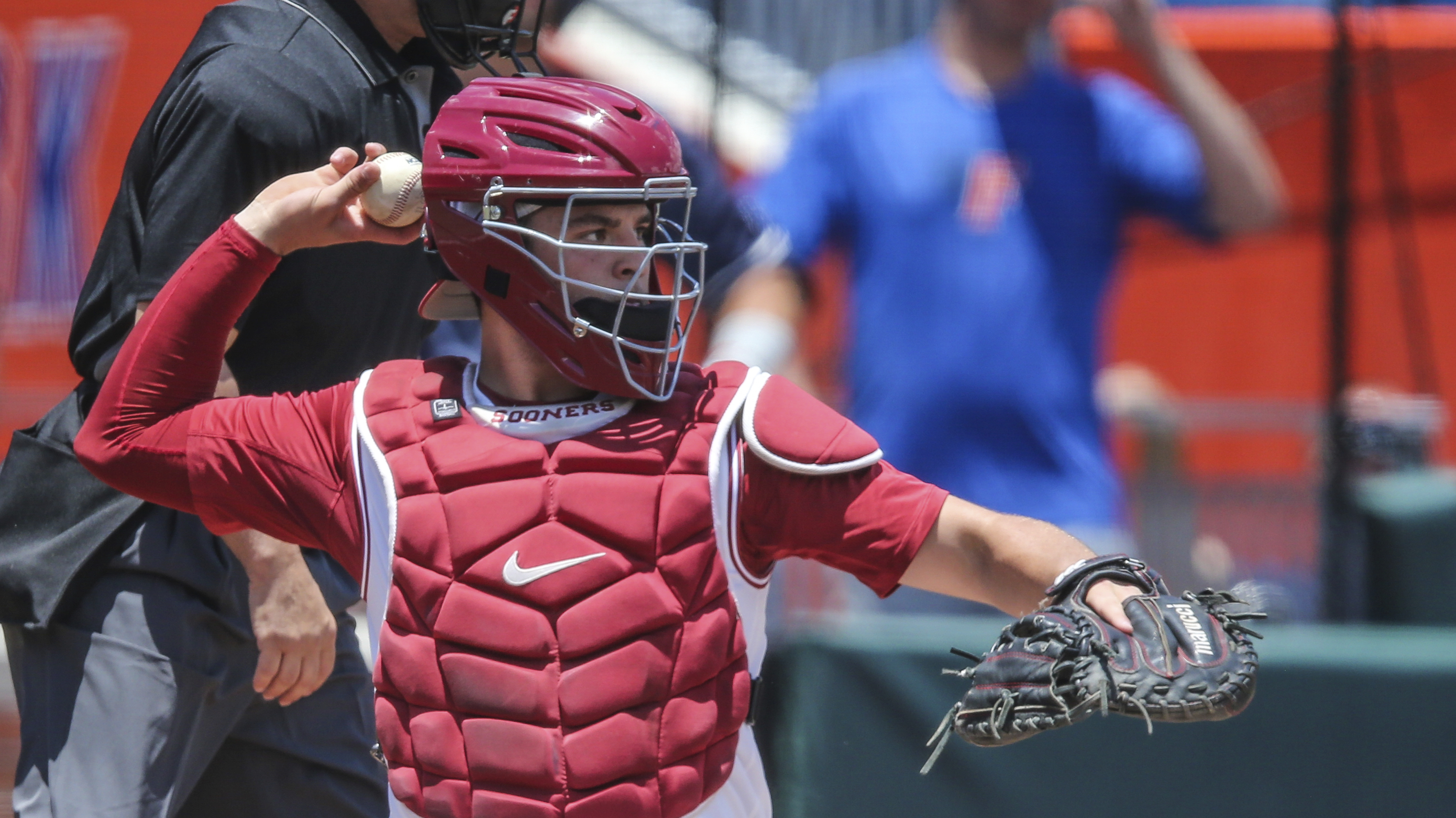 Oklahoma Sooners catcher Jimmy Crooks prepares to throw vs. Liberty Flames in Gainesville regional, June 4, 2022