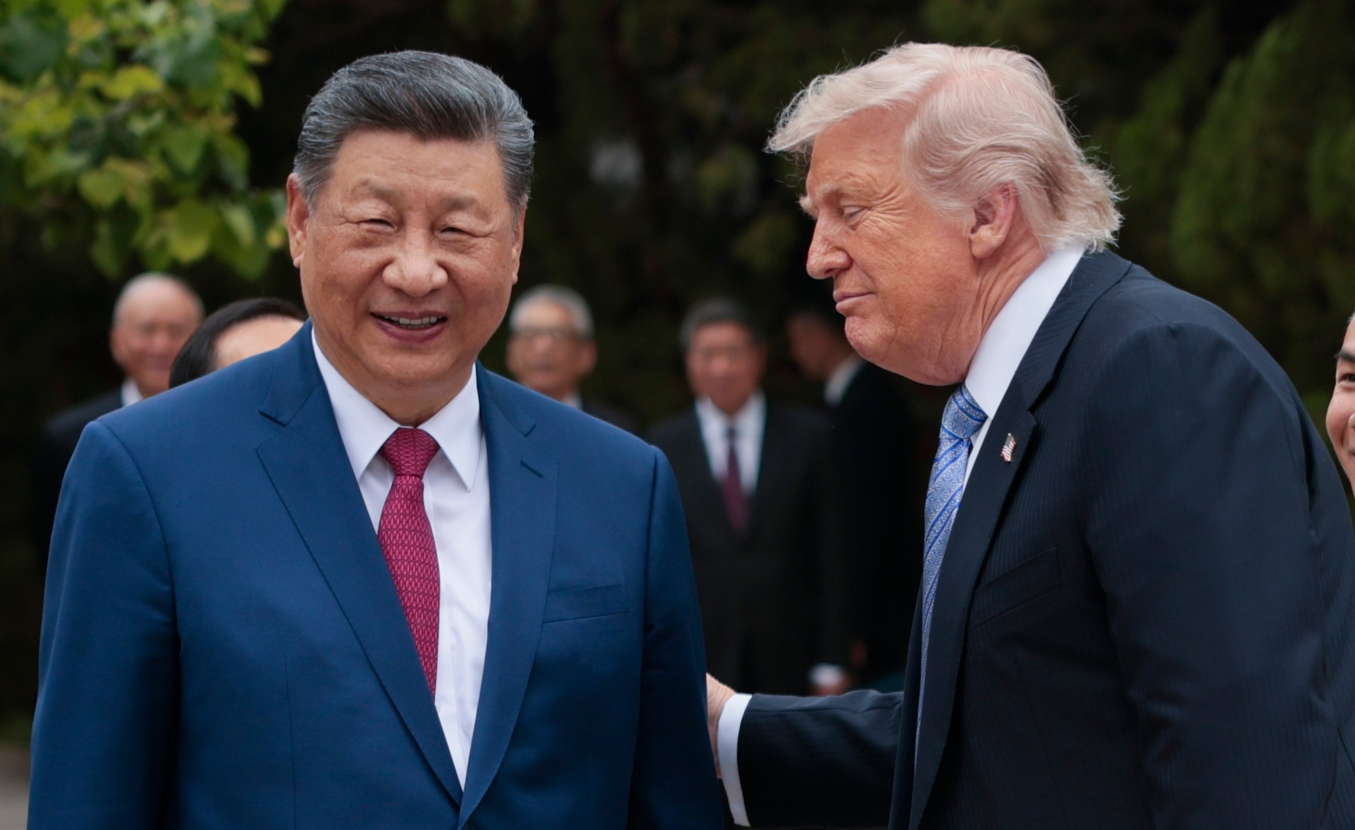 U.S. President Donald Trump, right, speaks with Chinese President Xi Jinping while leaving after a visit to the Zhongnanhai Garden in Beijing, Friday, May 15, 2026.