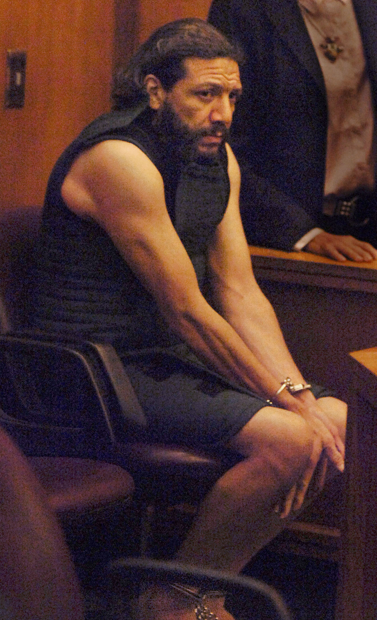 Jorge Barahona in handcuffs and shackles in 2011