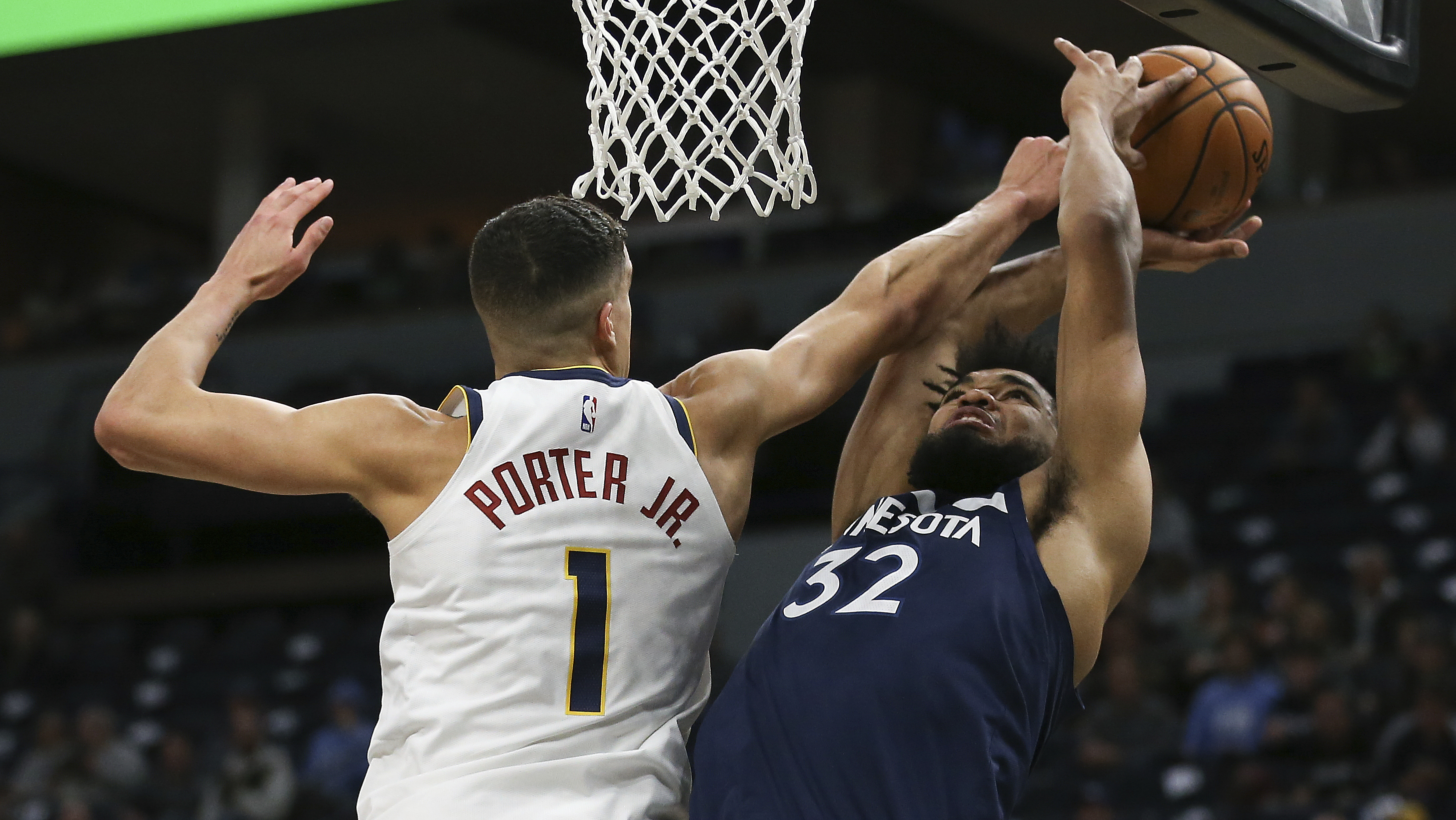Porter helps Nuggets overtake struggling T-wolves 107-100