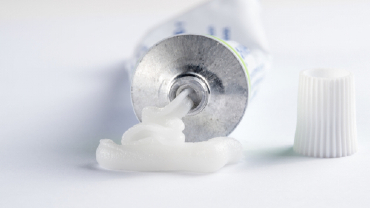 Stock image showing a tube of eye ointment.