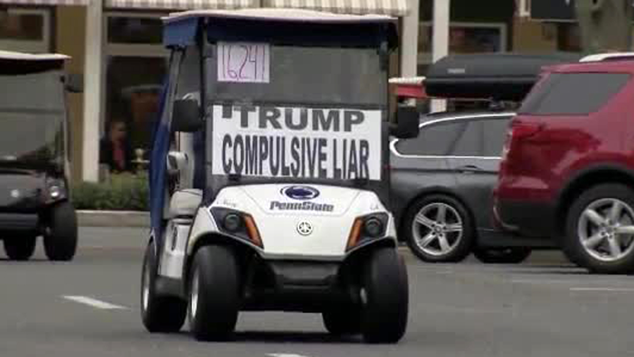 wptv-anti-trump-golf-cart.jpg